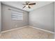 Bedroom has tile flooring and window for lots of natural light at 510 Peach Tree Ln, Altamonte Springs, FL 32701