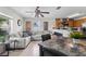 Open concept living area with view of kitchen and modern decor at 621 Bluebill Ln, Poinciana, FL 34759