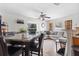 Bright living area with tile flooring, stylish furniture, and an inviting atmosphere at 621 Bluebill Ln, Poinciana, FL 34759