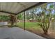 Large, well-maintained backyard featuring lush lawn, mature trees, and privacy fence at 714 28Th St, Orlando, FL 32805