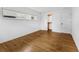 Bedroom features hardwood floors, white walls, closet and natural light, creating a comfortable atmosphere at 714 28Th St, Orlando, FL 32805