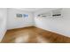 Bright bedroom with hardwood floors, white walls, and a window, offering a blank canvas at 714 28Th St, Orlando, FL 32805