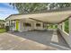 Spacious carport providing ample covered parking and access to the home at 714 28Th St, Orlando, FL 32805