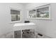 Home office with neutral paint, chair rail molding, and a white desk at 714 28Th St, Orlando, FL 32805