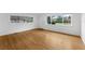 Inviting living room with gleaming hardwood floors and abundant natural light at 714 28Th St, Orlando, FL 32805