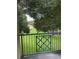 Balcony with green lawn view and trees at 7350 Westpointe Blvd # 234, Orlando, FL 32835