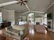 Spacious community clubhouse with wood floors, furniture and fireplace at 7350 Westpointe Blvd # 234, Orlando, FL 32835