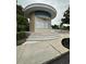 Community mail kiosk with multiple mailboxes in neutral colors and a curved entryway at 7350 Westpointe Blvd # 234, Orlando, FL 32835