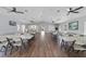 Clubhouse interior with multiple tables and chairs at 8211 Sun Spring Cir # 11, Orlando, FL 32825