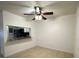 Dining area with ceiling fan and kitchen pass-through at 8211 Sun Spring Cir # 11, Orlando, FL 32825