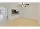 Dining room featuring tile floors and a view into the kitchen, creating a seamless and inviting atmosphere at 8211 Sun Spring Cir # 11, Orlando, FL 32825