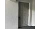 Close up of the building's door with a keypad at 8211 Sun Spring Cir # 11, Orlando, FL 32825