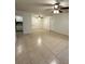 Spacious living room featuring tile floors, ceiling fans, and a bright atmosphere at 8211 Sun Spring Cir # 11, Orlando, FL 32825