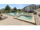 Community pools and hot tub with loungers at 8211 Sun Spring Cir # 11, Orlando, FL 32825