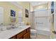 Bathroom with a granite countertop vanity, and a shower-tub combination at 8336 Sw 77Th Ct, Ocala, FL 34476