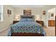 Cozy bedroom features matching nightstands, lamps, and tasteful decorations at 8336 Sw 77Th Ct, Ocala, FL 34476
