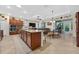 Spacious kitchen boasts a large island with granite countertops and modern appliances at 8336 Sw 77Th Ct, Ocala, FL 34476