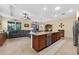 Expansive kitchen features a large island, modern appliances, and seamless flow to living areas at 8336 Sw 77Th Ct, Ocala, FL 34476