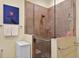 Modern glass-enclosed shower features updated fixtures and tile surround at 8336 Sw 77Th Ct, Ocala, FL 34476