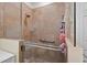 Modern glass-enclosed shower features updated fixtures and tile surround at 8336 Sw 77Th Ct, Ocala, FL 34476