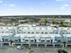New townhomes, an aerial view showing neighborhood rooftops and overall community at 879 City Walk Ln, Oviedo, FL 32765