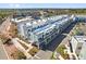 Amazing aerial view showcasing modern townhomes, landscaped surroundings, and parking areas at 879 City Walk Ln, Oviedo, FL 32765