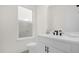 Bathroom features a modern sink, neutral walls, and tiled floors at 879 City Walk Ln, Oviedo, FL 32765