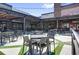 Outdoor seating area with cozy ambiance and string lighting, ideal for relaxation at 879 City Walk Ln, Oviedo, FL 32765