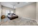 Cozy bedroom featuring arched windows and neutral decor at 8814 Southern Breeze Dr, Orlando, FL 32836