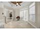 Bonus room with tile flooring, French doors and custom trim at 8814 Southern Breeze Dr, Orlando, FL 32836