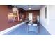 Themed garage with air hockey, tables, bar stools, and movie themed wall art at 8986 Cabot Cliffs Dr, Davenport, FL 33896
