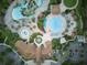 Aerial view showcasing the community's resort-style pool, clubhouse, and landscaped grounds at 9061 Dogleg Dr, Davenport, FL 33896
