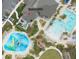 Overhead aerial view highlighting the community's pool, splash pad, and amenities at The Retreat Club at 9061 Dogleg Dr, Davenport, FL 33896