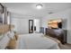 Serene bedroom features a comfy bed, a large dresser, and neutral wall colors at 9061 Dogleg Dr, Davenport, FL 33896