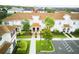 Beautiful condo showcasing a well-manicured lawn and a charming covered entryway for a welcoming curb appeal at 9061 Dogleg Dr, Davenport, FL 33896