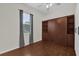 Bedroom featuring laminate flooring and built-in storage at 9435 Myrtle Creek Ln # 308, Orlando, FL 32832