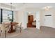 Neutral Living Room with plenty of sunlight entering through the window at 9435 Myrtle Creek Ln # 308, Orlando, FL 32832