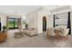 Open-concept living and dining area with plenty of natural light at 9435 Myrtle Creek Ln # 308, Orlando, FL 32832