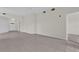 A spacious living room with tile floors, offering an open and airy feel at 9435 Myrtle Creek Ln # 308, Orlando, FL 32832