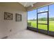 Relaxing screened patio with golf course view, perfect for enjoying the outdoors at 9435 Myrtle Creek Ln # 308, Orlando, FL 32832