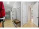 Spacious walk-in closet offering built-in shelving, plenty of storage, and bench seating at 106 Mist Flower Ln, Groveland, FL 34736