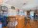 This in-home bar features wood accents and a dart board at 12130 Lakeshore Dr, Clermont, FL 34711