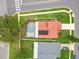 Aerial view showcasing the property's screened pool, brick paver patio, and residential neighborhood at 12300 Abberton Ct, Orlando, FL 32837