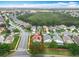 Charming single-Gathering home with red tile roof, enclosed pool, and lush landscaping in a desirable neighborhood at 12300 Abberton Ct, Orlando, FL 32837