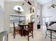Breakfast nook featuring natural light and comfortable seating near kitchen and storage at 12300 Abberton Ct, Orlando, FL 32837