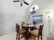 Cozy breakfast nook with natural light and ample storage space perfect for Gathering dining at 12300 Abberton Ct, Orlando, FL 32837