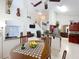 Bright living room featuring an open floor plan, tall ceilings, and modern decor at 12300 Abberton Ct, Orlando, FL 32837