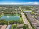 Breathtaking aerial view showcasing serene lakes and the residential community at 13055 Overstreet Rd, Windermere, FL 34786