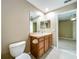 Standard bathroom with single sink and tile flooring at 13055 Overstreet Rd, Windermere, FL 34786