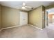 Bedroom with double doors to closet and view of upstairs at 13055 Overstreet Rd, Windermere, FL 34786